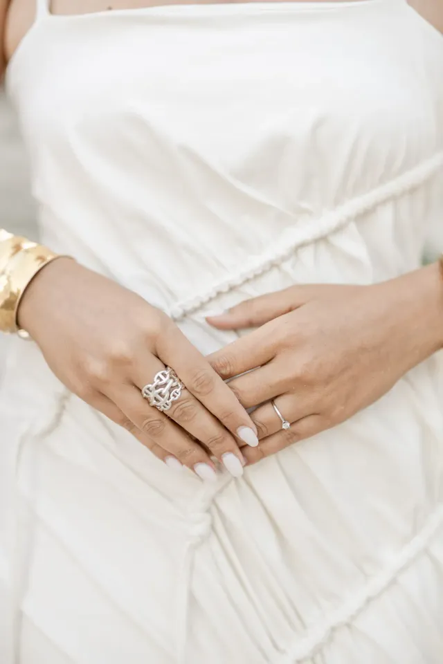 Detail of Nancy and Lucas's hands, engagement session in Sausset-les-Pins