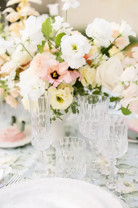 Floral centrepiece and crystal glassware