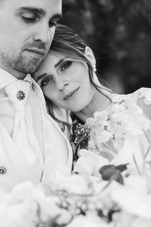 Black and white embrace of the bride and groom, intimate portrait at a quiet wedding in Provence